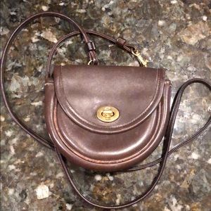 Authentic Coach mini brown leather crossbody bag.